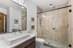 Master bath with a stunning tile shower 